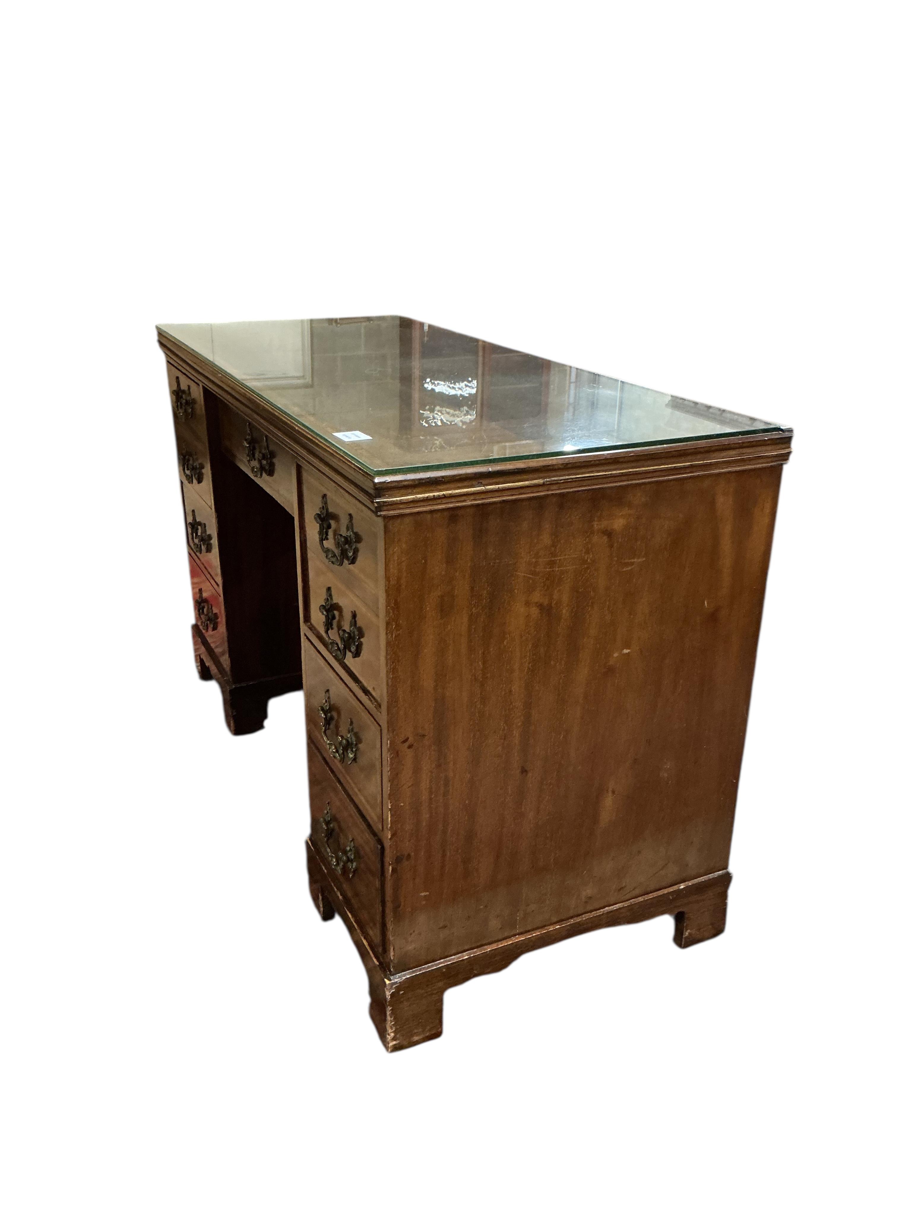 An Edwardian inlaid mahogany kneehole dressing table, width 120cm, depth 53cm, height 74cm
